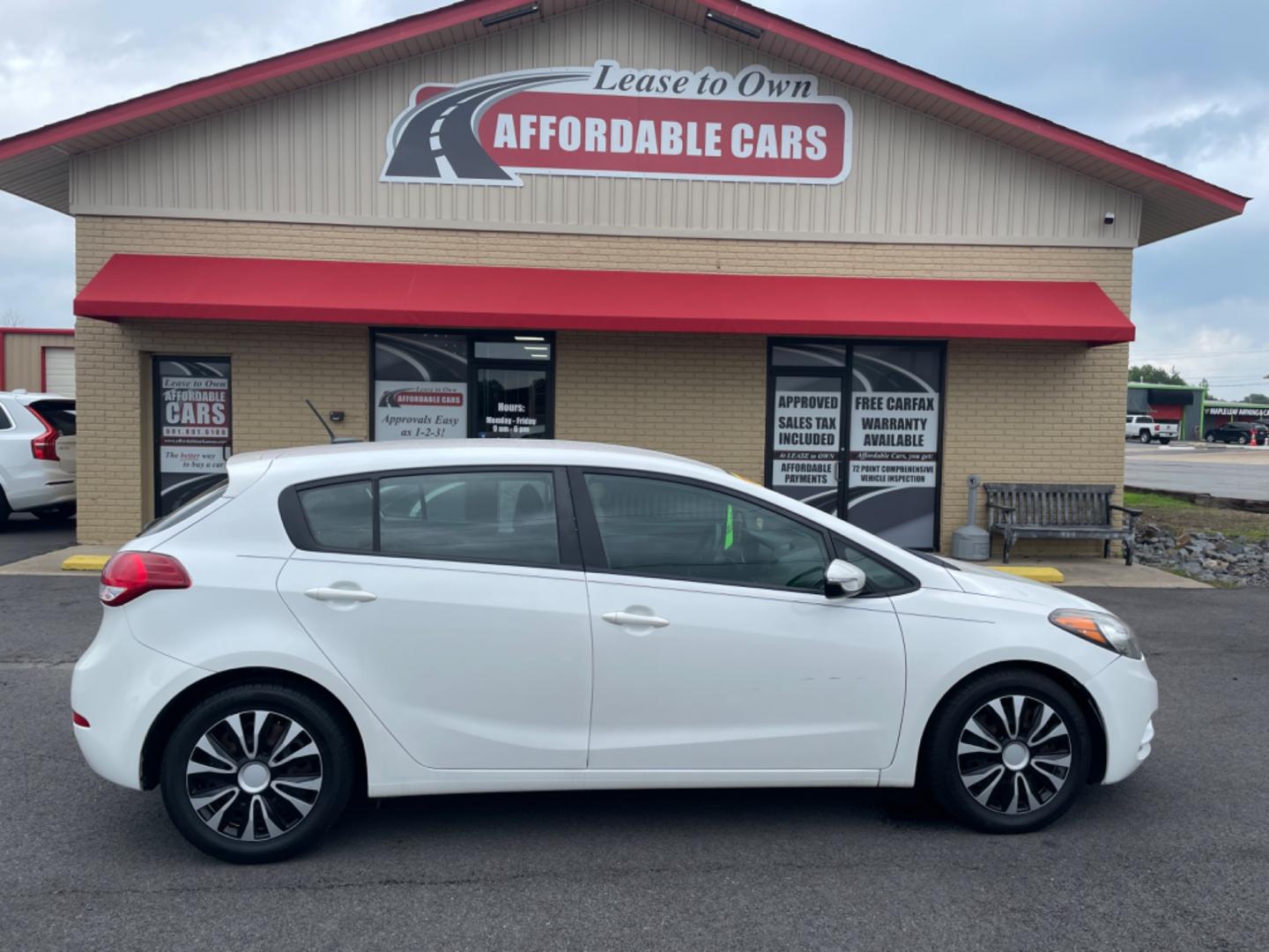 2016 White Kia Forte5 (KNAFK5A86G5) with an 4-Cyl, GDI, 2.0 Liter engine, Auto, 6-Spd w/Sportmatic and Active ECO System transmission, located at 8008 Warden Rd, Sherwood, AR, 72120, (501) 801-6100, 34.830078, -92.186684 - Photo#0